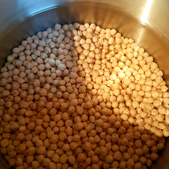 Chickpeas soaking in a bowl