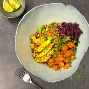 Alt text: Midlife Fusion Bowl with quinoa, crispy tofu and fermented vegetables — gut health perimenopause recipe by Jungle Goddess