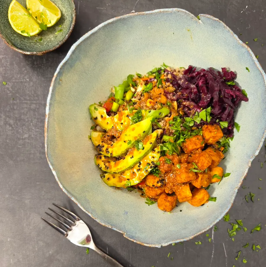 Alt text: Midlife Fusion Bowl with quinoa, crispy tofu and fermented vegetables — gut health perimenopause recipe by Jungle Goddess