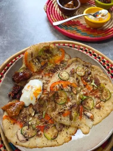 Cooked dosa served with pickles, chutney and yogurt — gut health and cooking ferments in practice